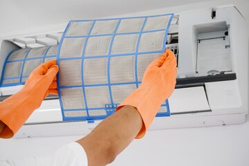 asian man cleaning air conditioner dirty filter 293060 4611
